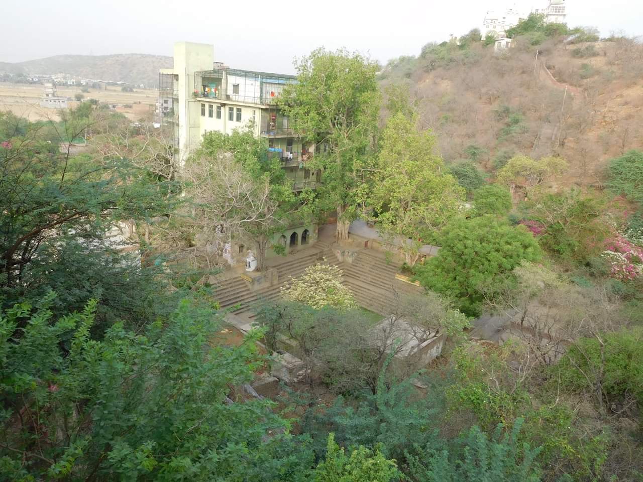 Beautiful View of Radha Sarovar, Maanmandir and Gehvarvan from Rasik Saint Shri Nagaridas's Bhajan Kutir near Mor kuti in Gehvar Van, Barsana. Radhey Radhey.