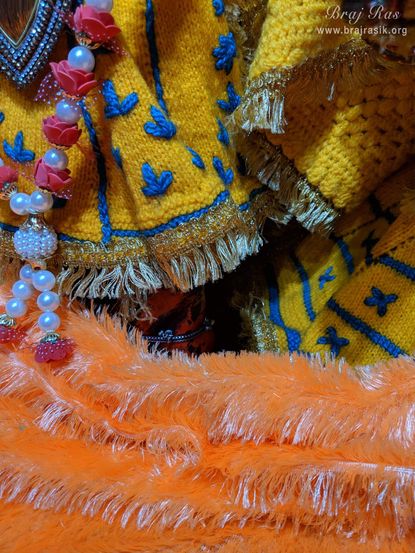 When Shri Tulsidas and Meera Bai came to Vrindavan, they touched the feet of the deity. So from that day till today, everyone is allowed to freely touch the feet and take blessings from the deity.