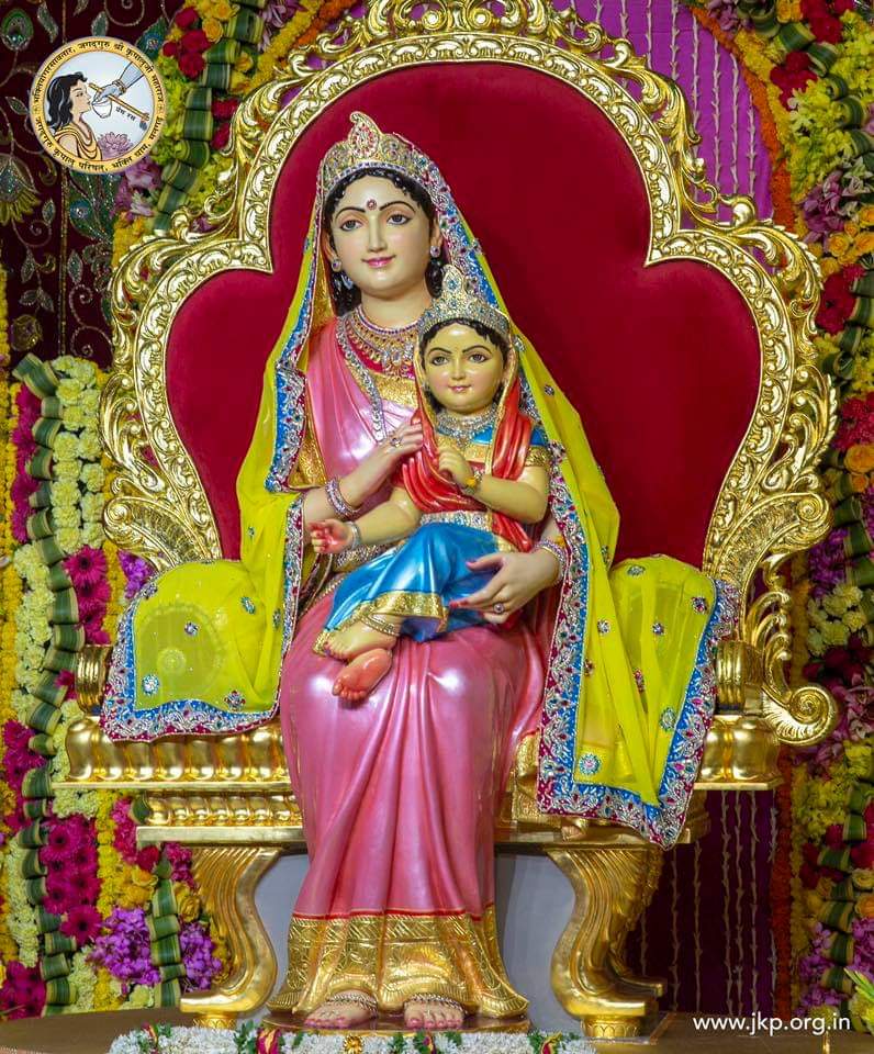 Shri Radha in the lap of her mother Kirti. 

(Photo belongs to JKP)