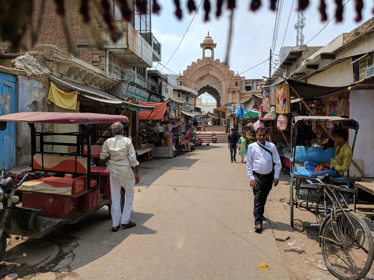 Shri Lalit Nikunj or Shahji temple or Tedekhambe Wala temple is located very near to Nidhivan at Vrindavan. In the photo, If you take right you will reach directly to Nidhivan however if you go straight you will reach Shahji temple.