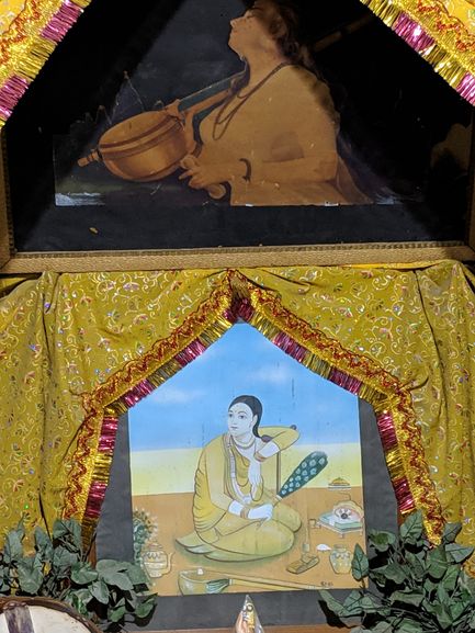 Close darshan of ancient portrait of Mirabai at Mirabai Temple.