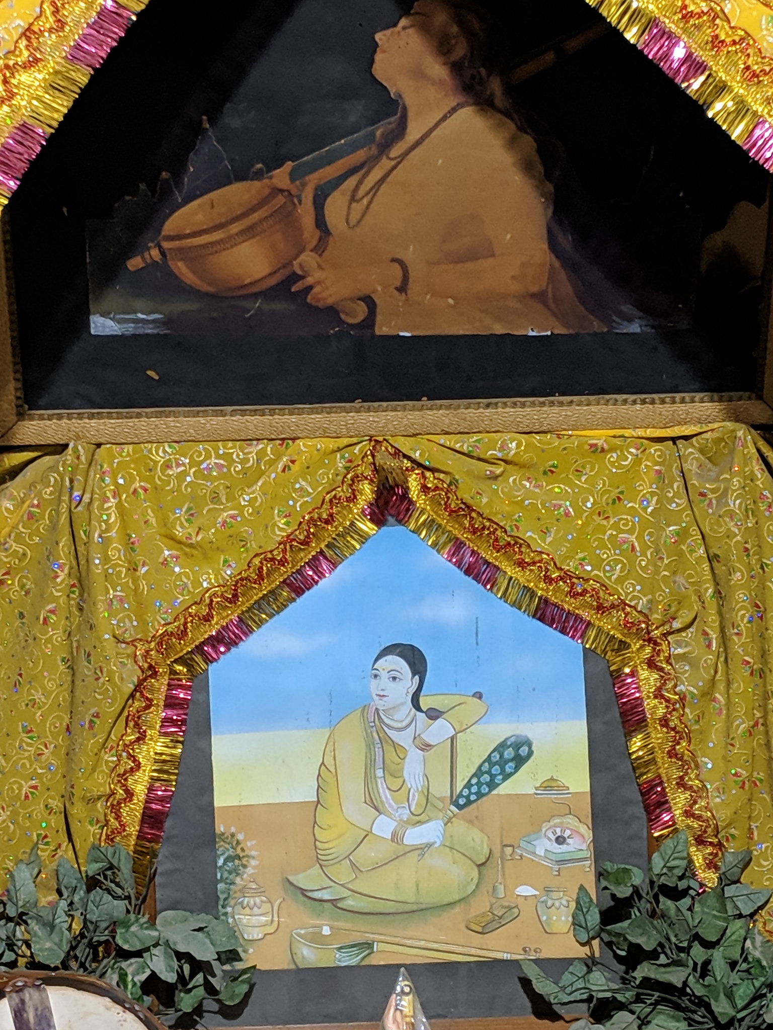 Close darshan of ancient portrait of Mirabai at Mirabai Temple.