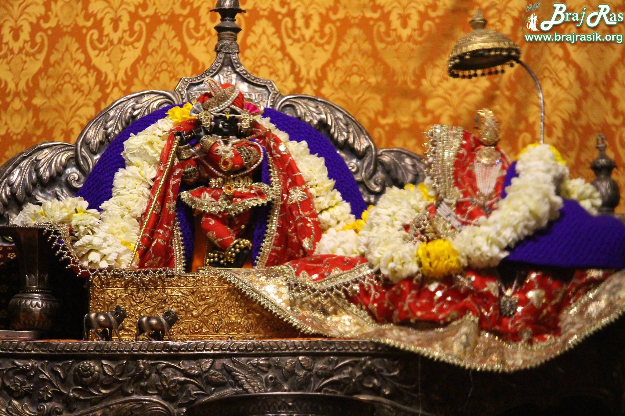 Shri Radharaman Ji in Orange Attire.