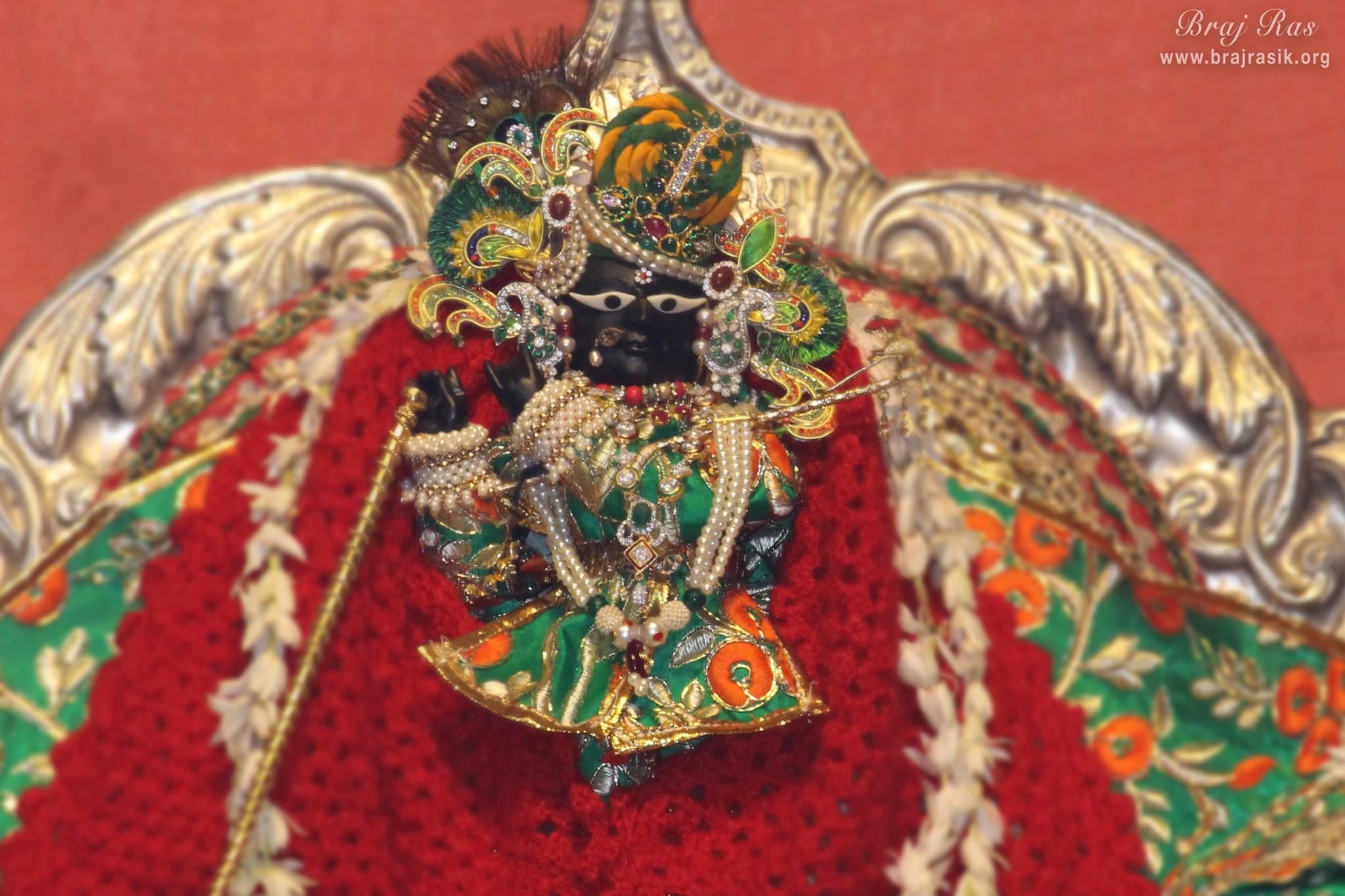 Shri Radharaman Ji in green Attire.