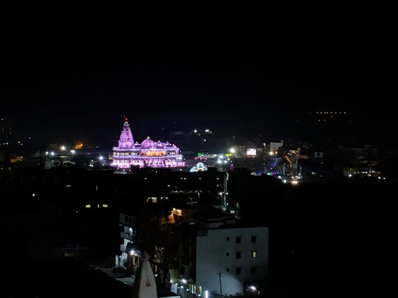 Sky view of Prem Mandir in pink lighting
