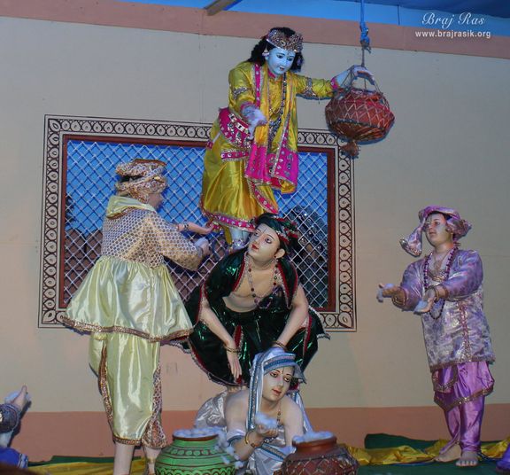 Darshan of Shri Krishna doing Makhan Chori Leela with his friends in Prem Mandir