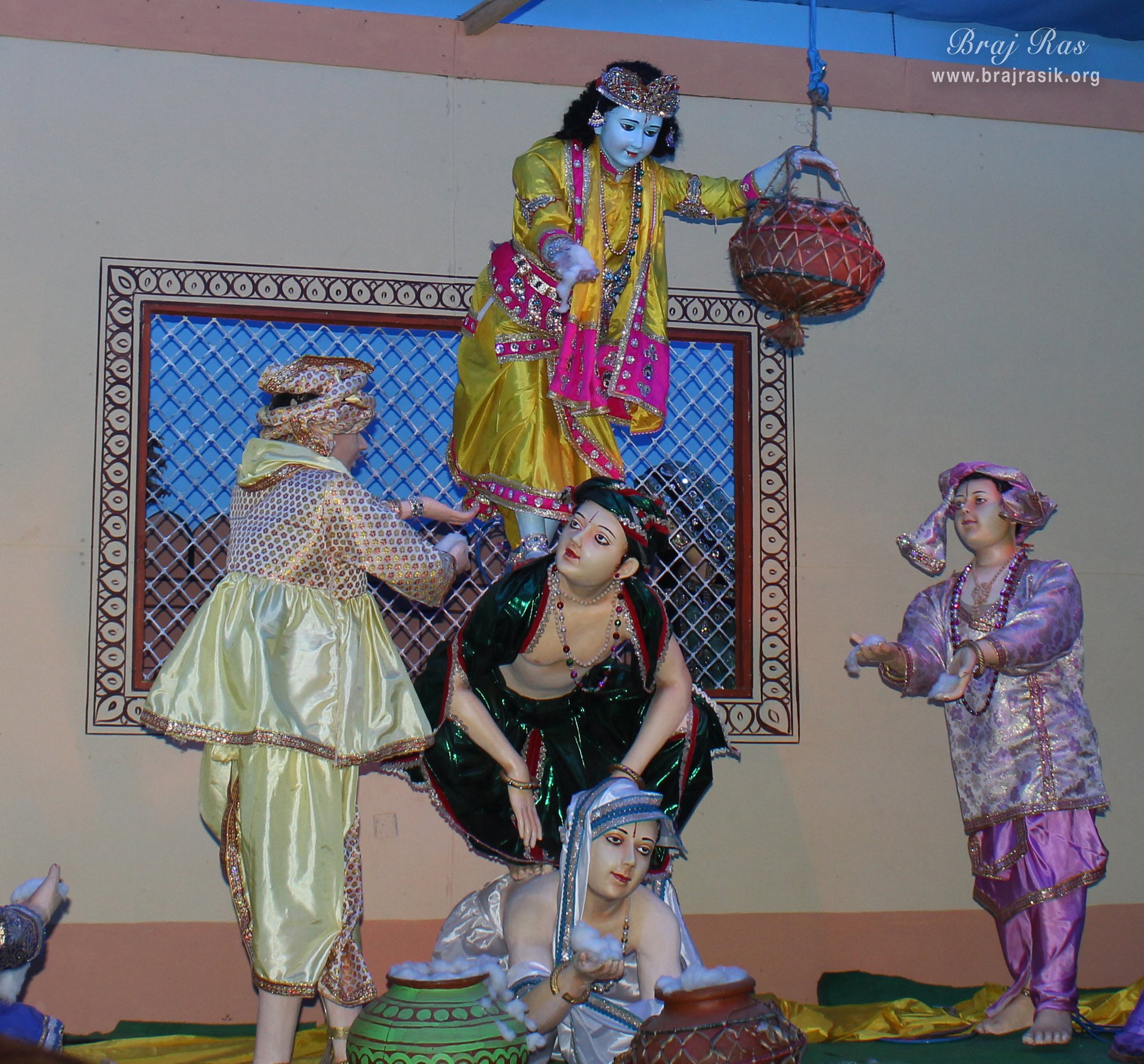 Darshan of Shri Krishna doing Makhan Chori Leela with his friends in Prem  Mandir