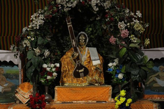 Swami Haridas Ji's darshan in yellow attire at Swami Haridas Kunj Kuti, Vrindavan