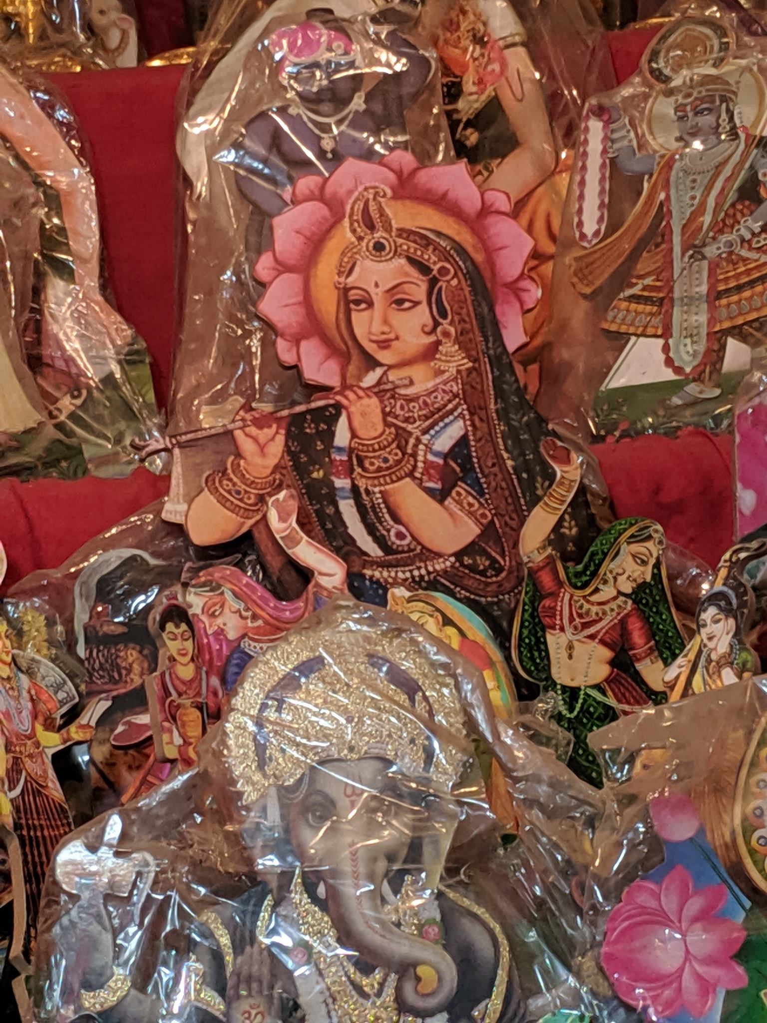 Shri Radharani holding flute portrait stand in Banke Bihari Gali, Vrindavan