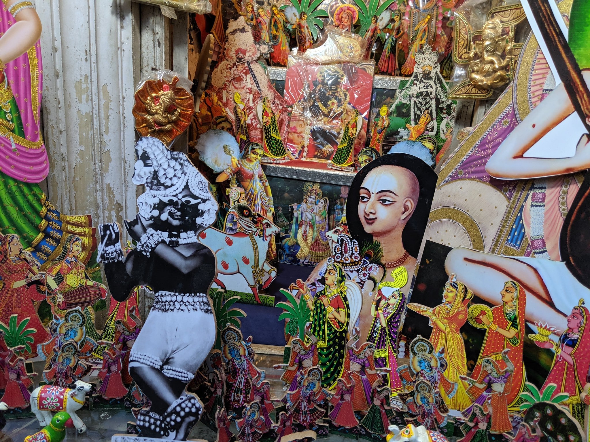 A shop with various photo stands in Banke Bihari Gali, Vrindavan