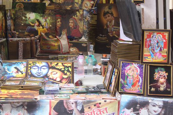 A shop with various photo stands of Shri Radha Krishna in Banke Bihari Gali, Vrindavan