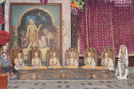 View of Chaitanya Mahaprabhu Portrait stand with statue of Six goswami at Shri Radha Damodar Temple, Vrindavan