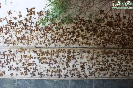 Sign of Swastik made of cowdung on walls of Maan Sarovar or Mana Sarovar, Vrindavan