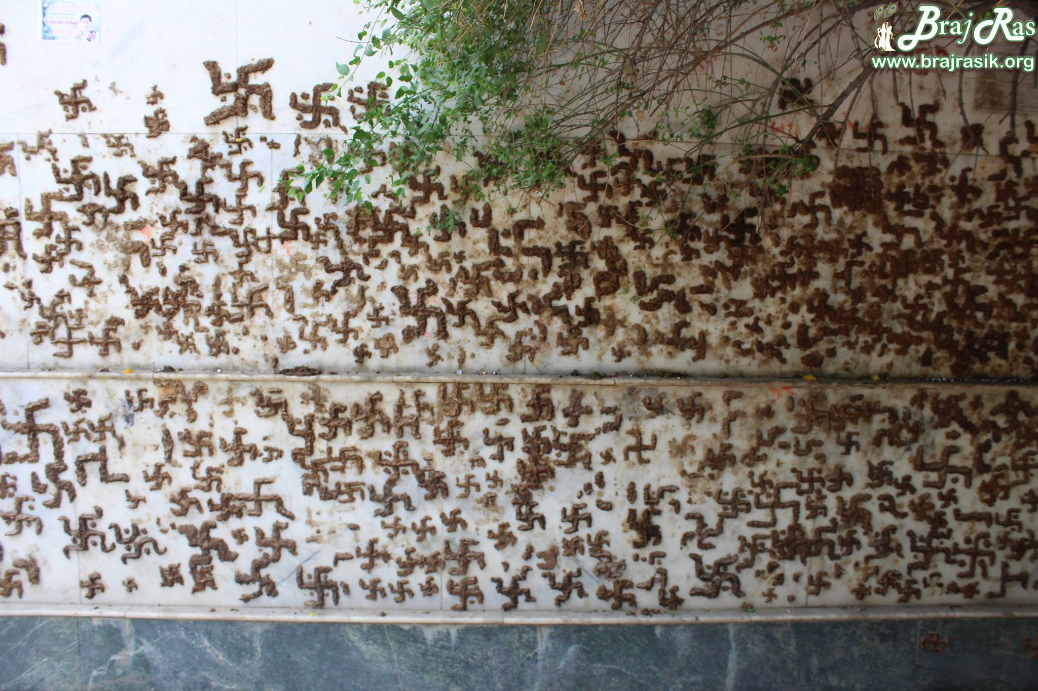 Sign of Swastik made of cowdung on walls of Maan Sarovar or Mana Sarovar, Vrindavan