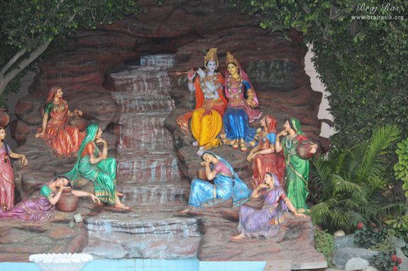 Darshan of Shri Radha Krishna seated on Giriraj Ji near waterfall at Rangeeli Mahal - Barsana
