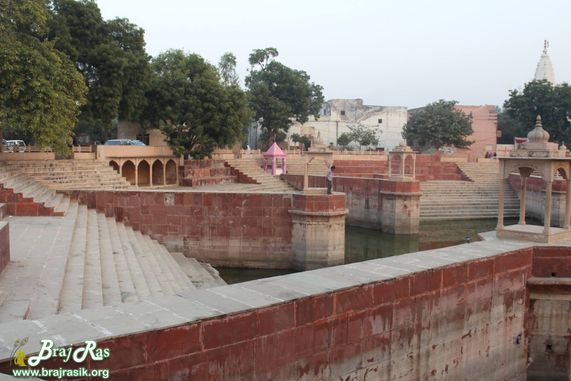 A celestial view of stairs with Prem Sarovar - Barsana