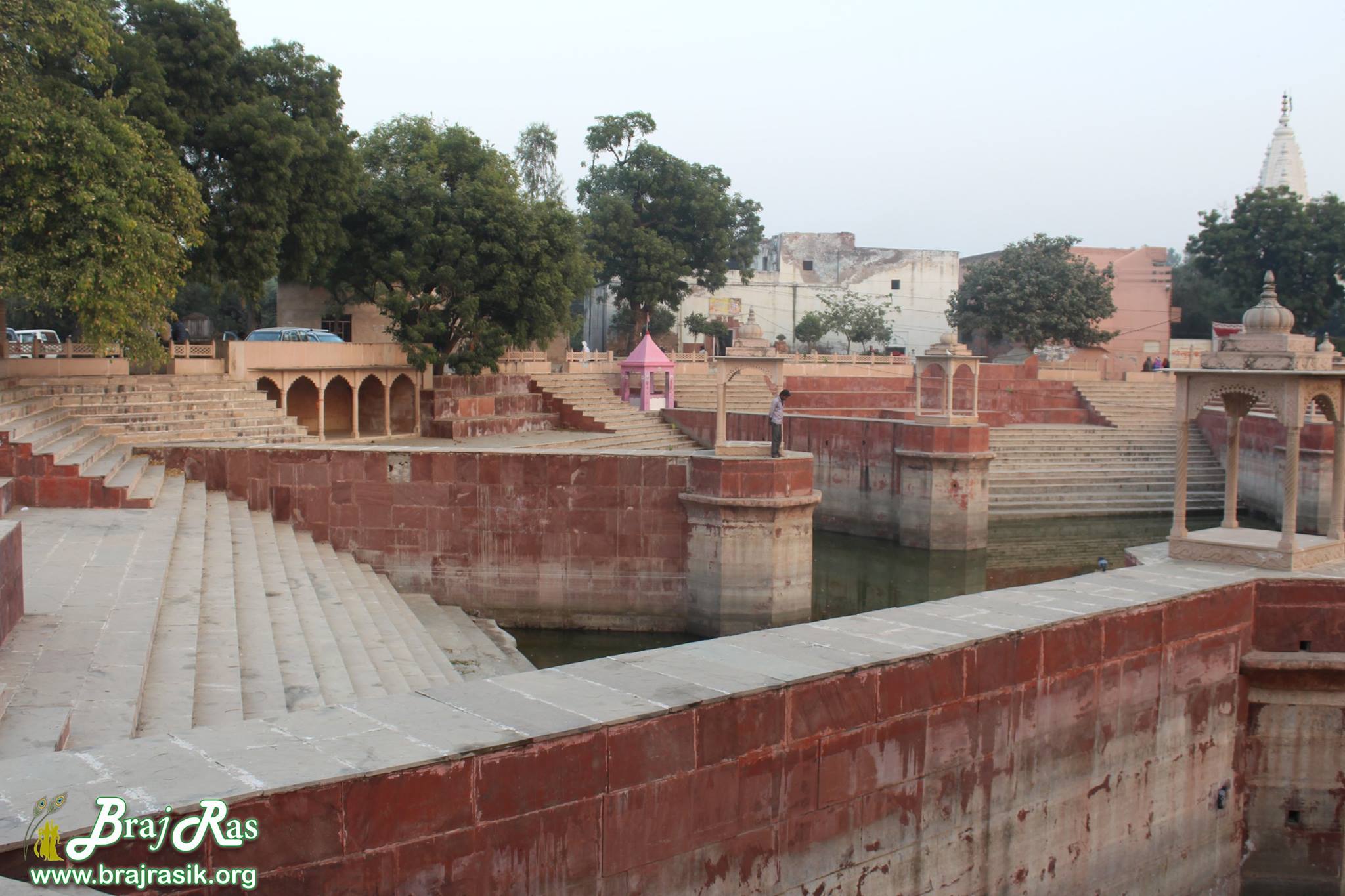 A celestial view of stairs with Prem Sarovar - Barsana