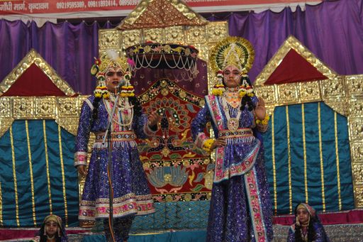 Darshan of Shri Radha Krishna standing in blue attire at Raas Leela Moments, Vrindavan
