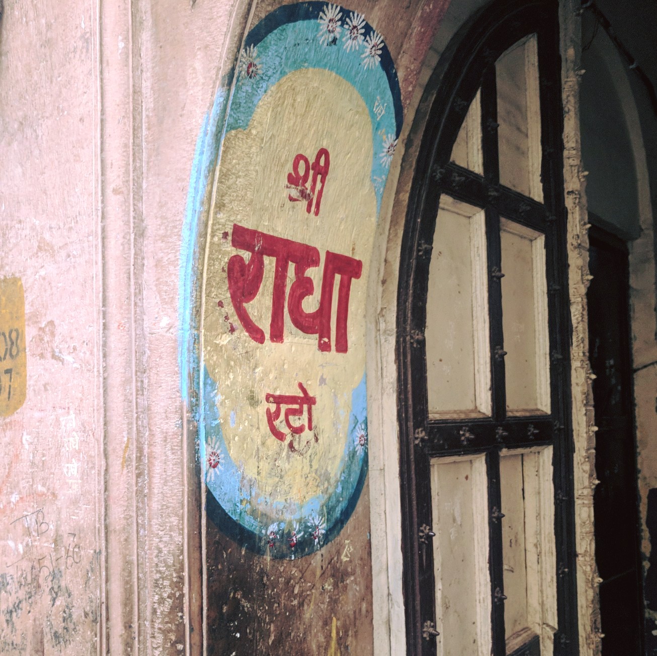 "Shri Radha" name written outside a door at Vrindavan.
