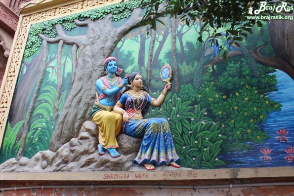 Shri Krishna combing hair of Shri Radharani at Imlitala, Vrindavan.