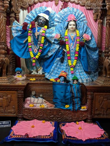 Beautiful darshan of Shri Radha Krishna in blue attire at Imlitala, Vrindavan.