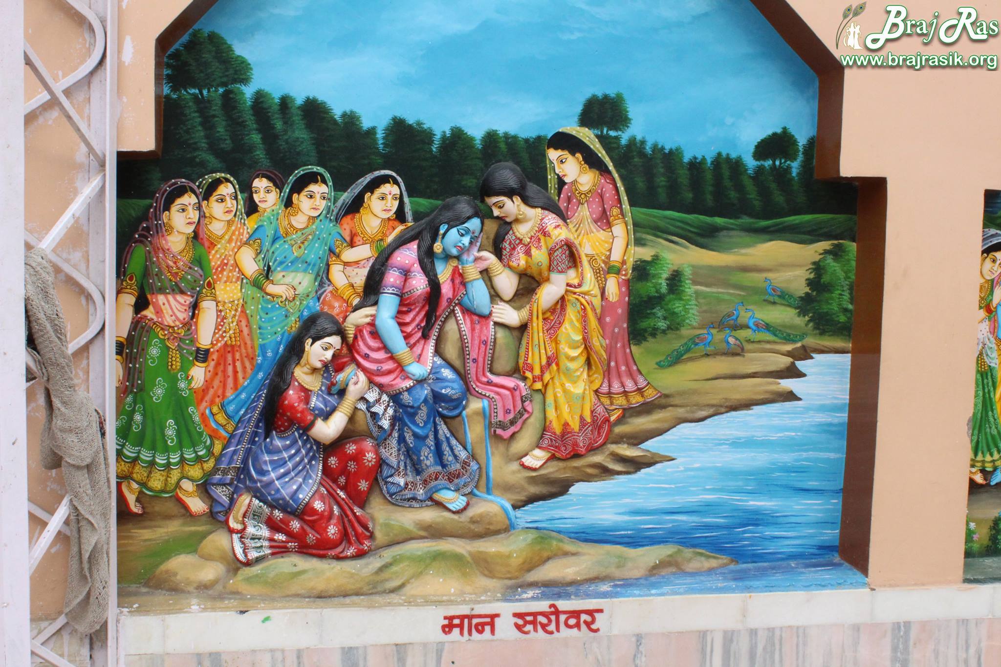 An art depicted on the wall "Shri Radharani crying during Maan Leela and a pond created by the tears of her" at Imlitala, Vrindavan.
