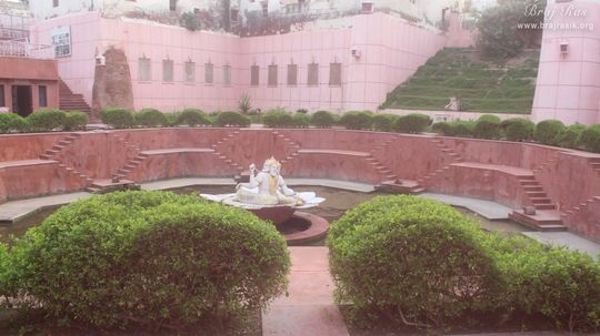 Lord Brahma seated on a lotus in the middle of Brahma Kunda, Vrindavan