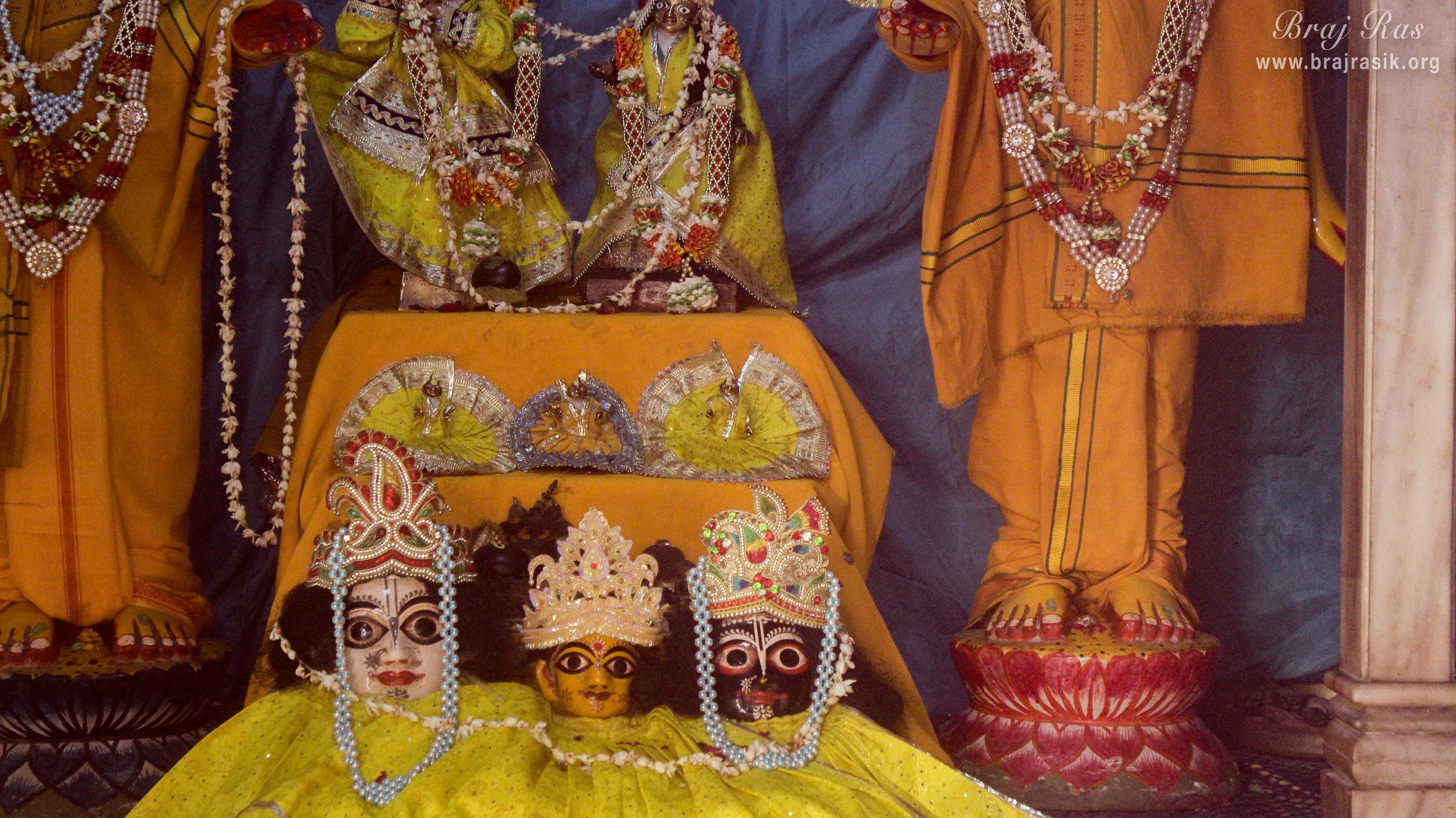Close deity darshan in yellow attire at Shringar Vat, Vrindavan