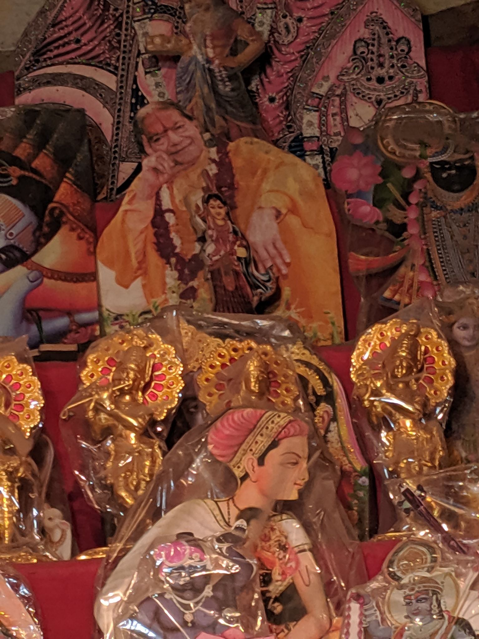 Photos of Kripalu Ji and other various saints and deities in Banke Bihari Gali