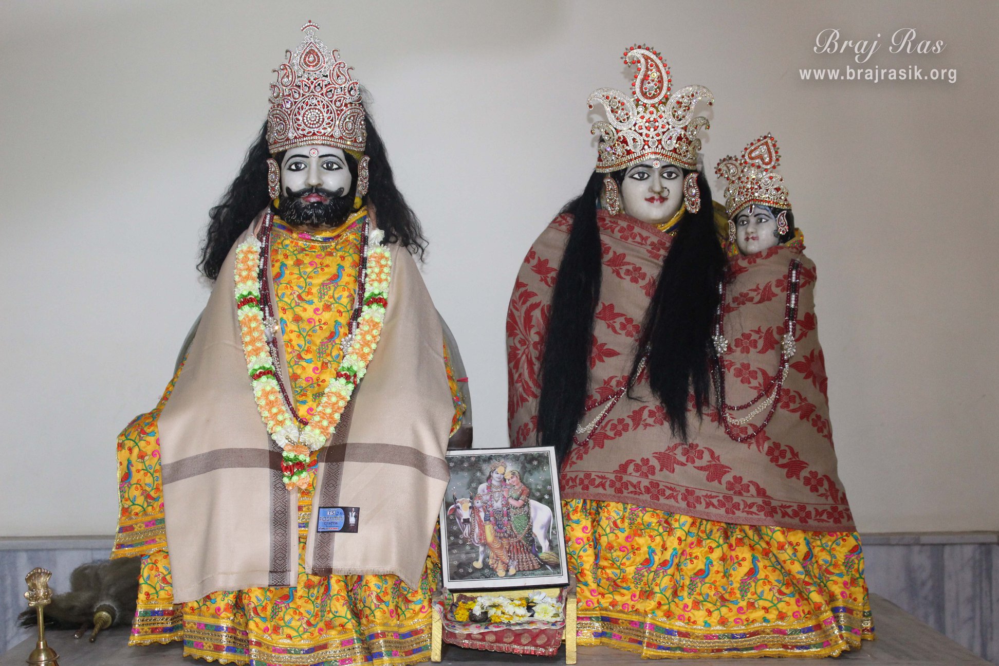 A close darshan of Little Krishna in the lap of Mother Yashoda and Nand Maharaj in Pagal Baba Ashram
