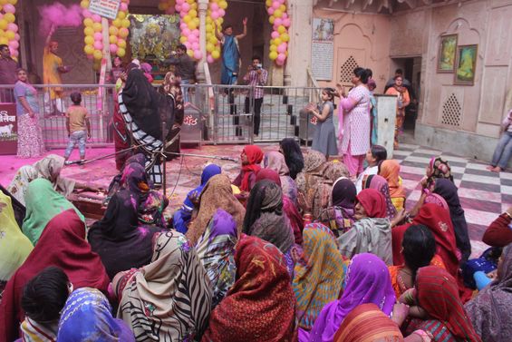 Devotees having darshan during Holi festival in Shri Radha Damodar Temple, Vrindavan