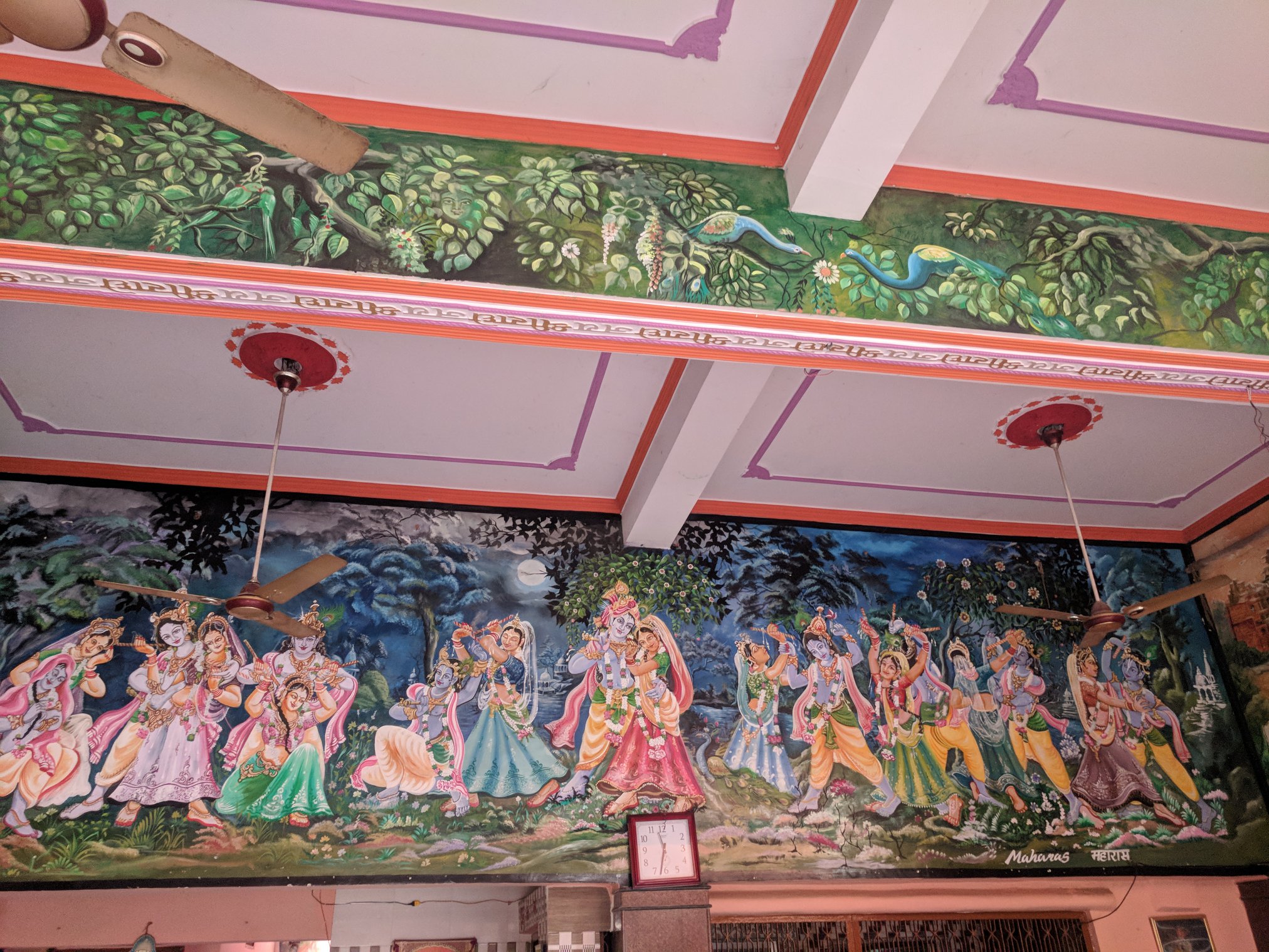The painting of Shri Radha Krishna's Keli Leela depicted on the wall of the temple at Advaita Vata, Vrindavan