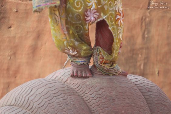 Lotus feet darshan of Shri Krishna dancing on the hood of Kaliya Serpent in Kaliya Deh or Kaliya Ghat, Vrindavan
