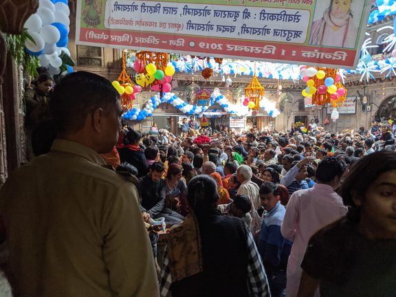 Devotees getting darshan of Shri Banke Bihari Ji on a festival day inside Shri Bankey Bihari Temple, Vrindavan