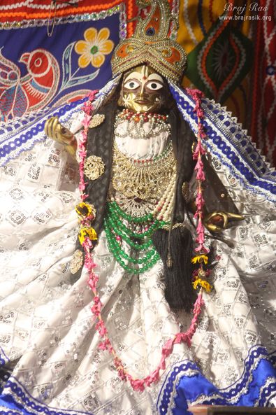 Full view darshan in white attire of Shri Radharani in Shri Radha Gopinath Ji Temple, Vrindavan