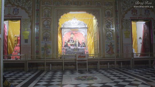 Darshan from courtyard of Shri Radha Krishna in the attire of peacock feather design at Shriji Ka Mandir, Vrindavan