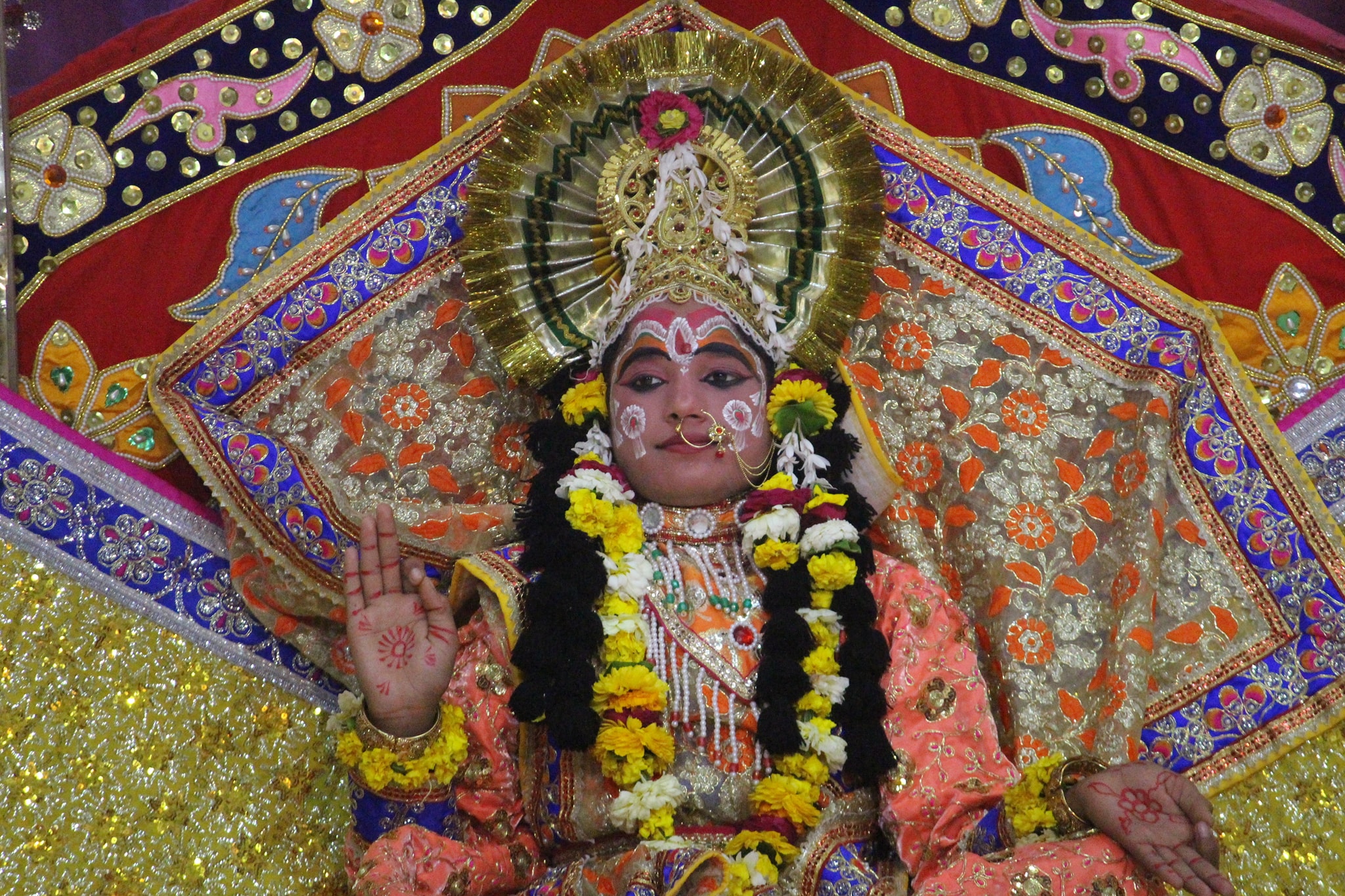 Darshan of Shri Radha in orange attire in Raas Leela, Vrindavan