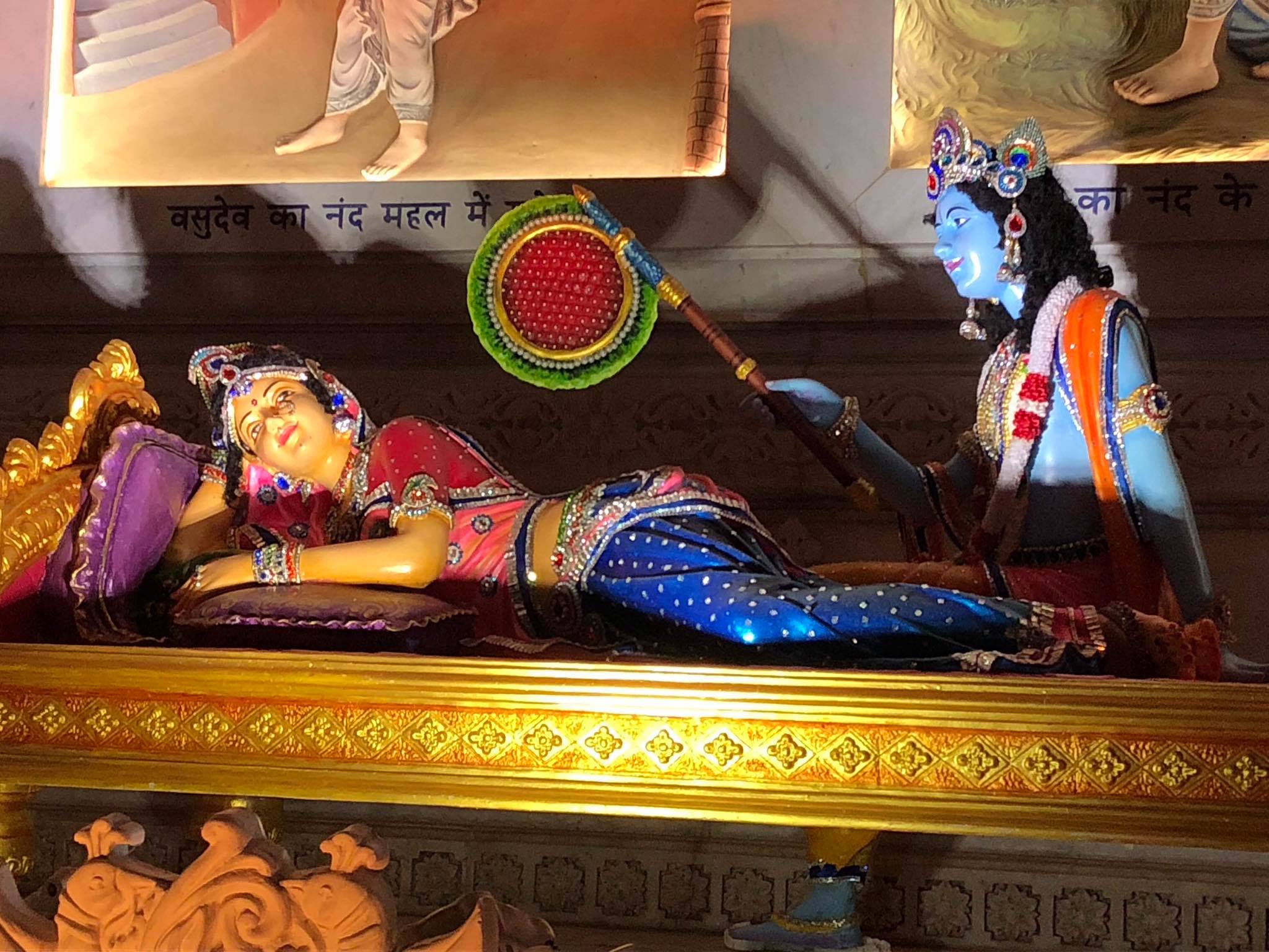 Shri Radha taking rest and sleeping while Shri Krishn fanning Shri Radha at Prem Mandir, Vrindavan
