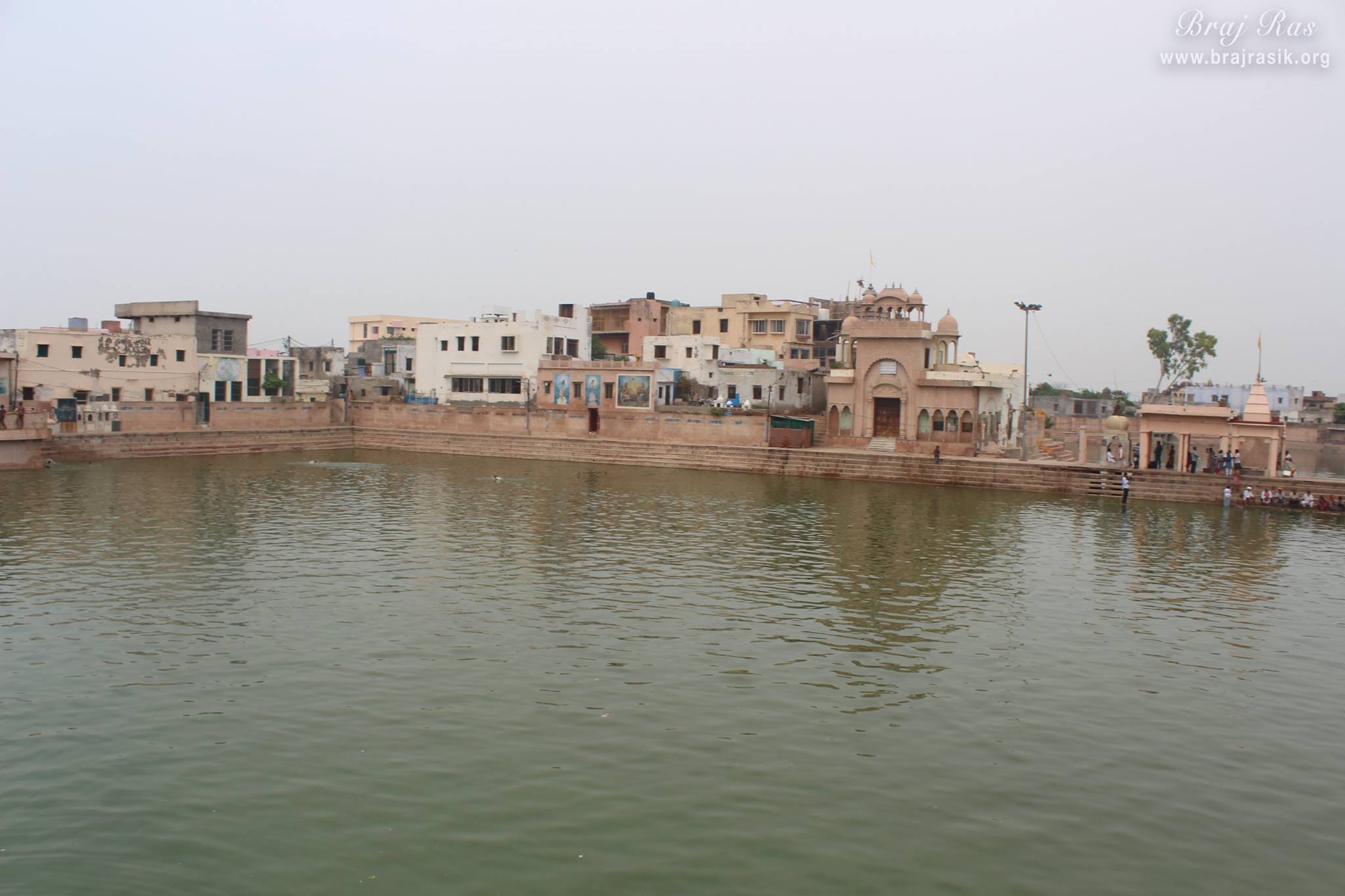 An evening view of waters of Shri Radha Kund.