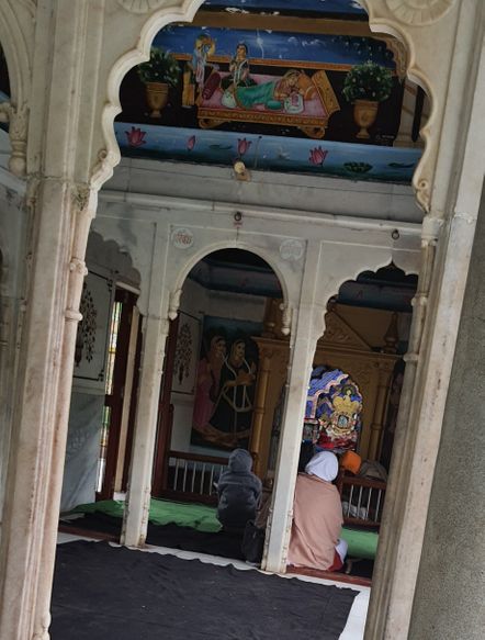 Darshan of Shri Krishn serving Shri Radha at Seva Kunj, Vrindavan.