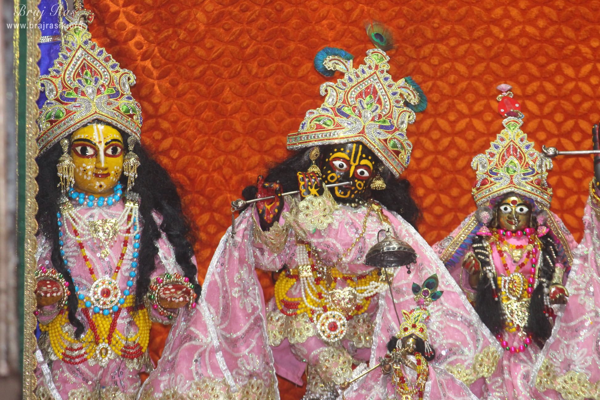 Deity Darshan of Shri Radha Krishna in light pink and silver attire at Shri Radha Gokulananda Temple, Vrindavan