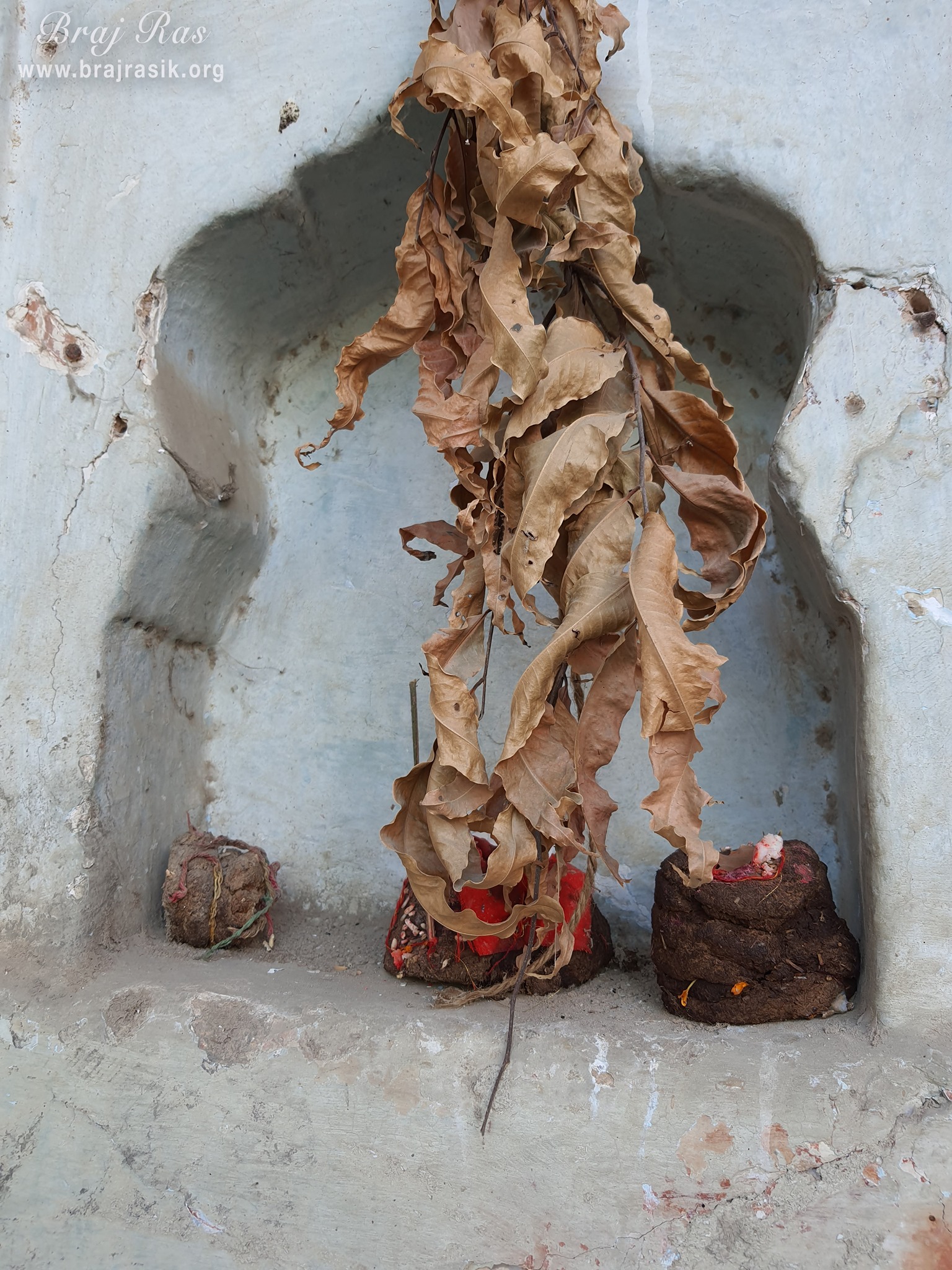A close view of the space made for lamps in the wall at Ashtasakhi Temple - Barsana