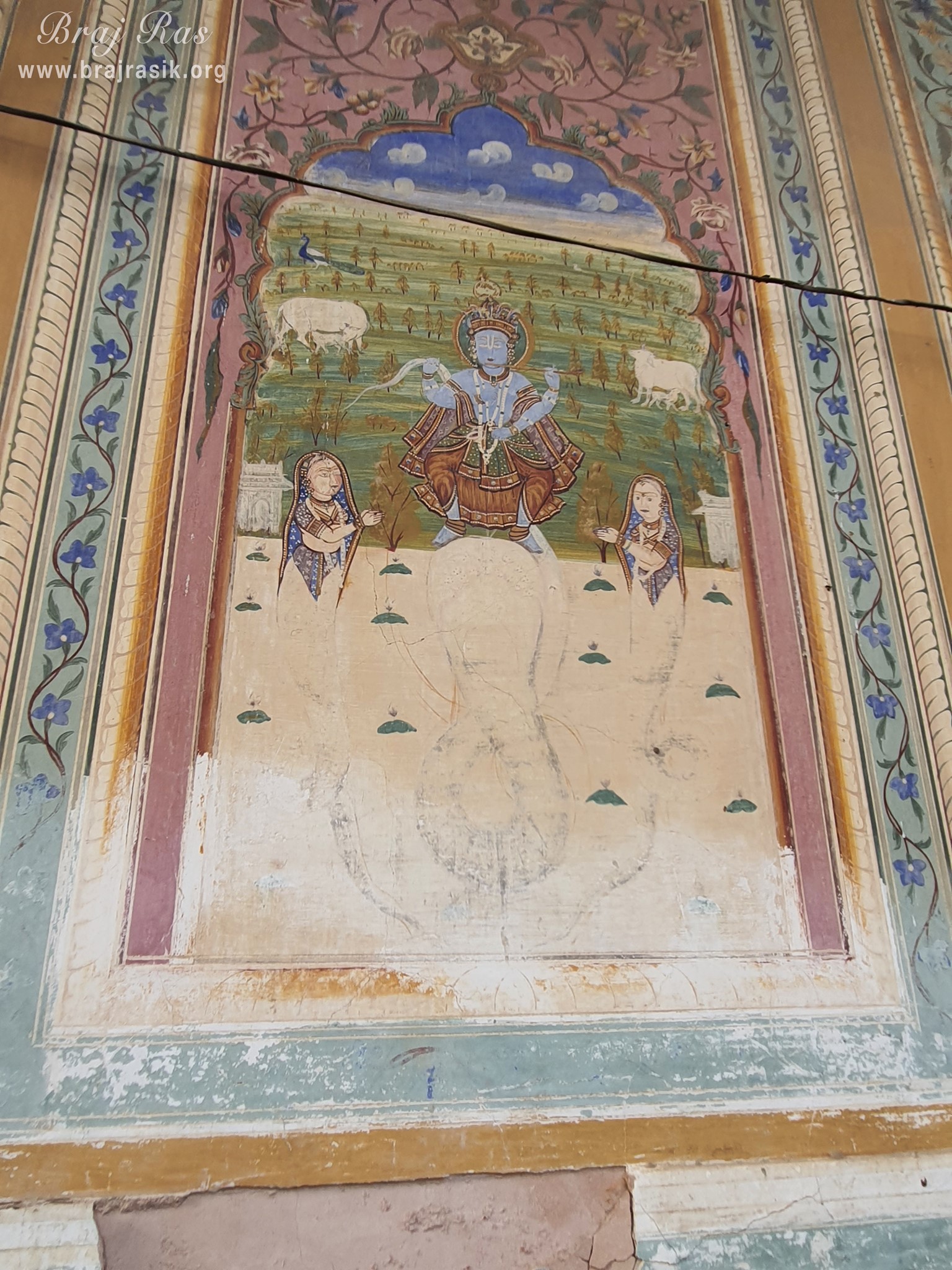 Painting of Lord Krishna dancing on Kaliya Serpent depicted on the wall at Shri Kushal Bihari Temple, Barsana