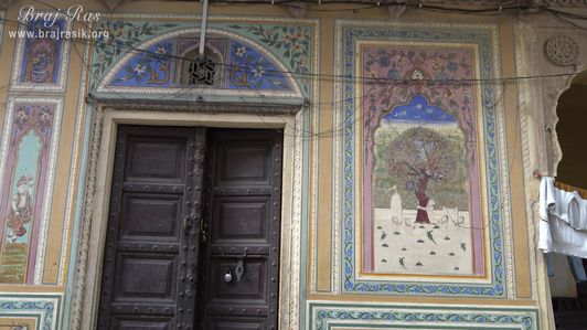 Painting of Lord Krishna stealing the clothes of milkmaids depicted on the wall at Shri Kushal Bihari Temple, Barsana