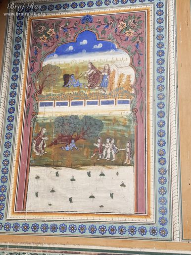 Painting of Shri Krishna's childhood pastimes depicted on the wall at Shri Kushal Bihari Temple, Barsana