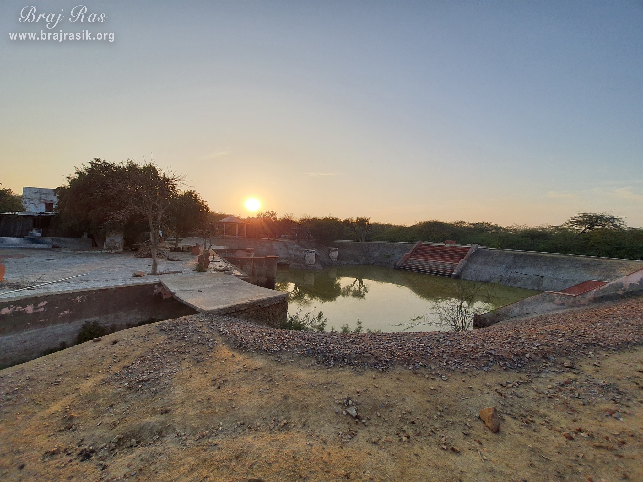 Beautiful view of sunrise at the pond near Shyam Kuti, Govardhan