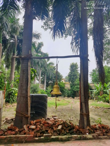 View of a big bell hanging in Devaraha Baba Samadhi/Bhajan Sthal.