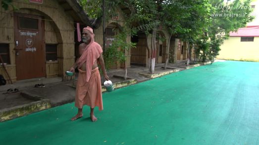 A saint standing near his hut at Ramanreti, Gokul - Braj.