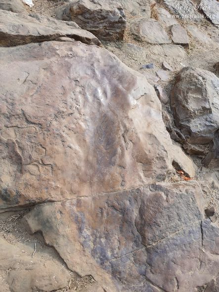 The fisalni (slippery) rock where Shri Krishn used to play with his cowherd friends at Mukharvind, Govardhan.