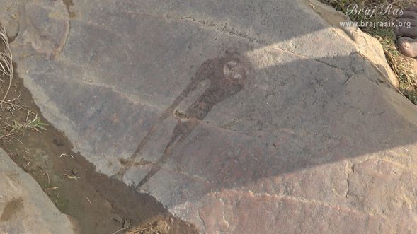 The full moon of Karvachauth is inscribed on this rock at Mukharvind in Govardhan.